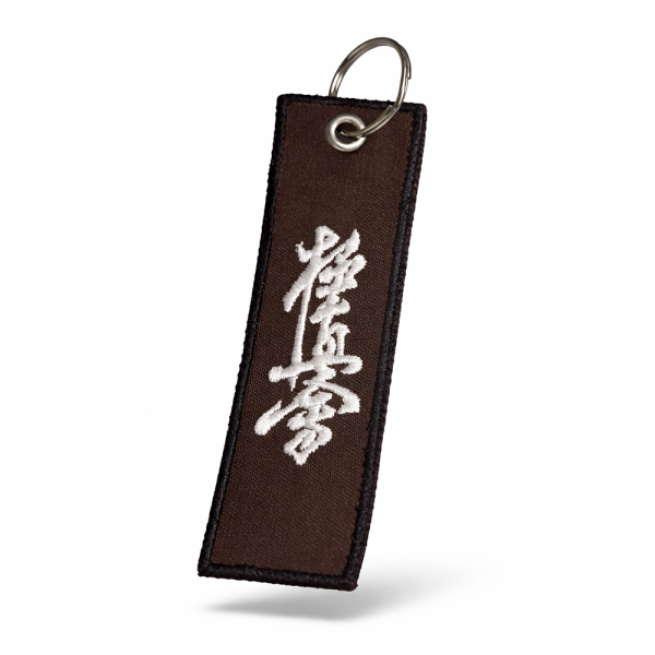 wve1wyj57s-1.png Brelok Karate Kyokushin Brązowy - haftowany